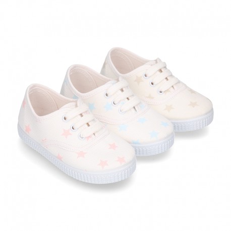 Cotton canvas Kids Bamba type shoes with shoelaces and stars print.