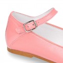 with buckle fastening angel style in seasonal colors.