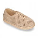 Suede leather Laces up style espadrille shoes with perforated design.