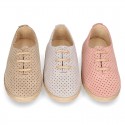 Suede leather Laces up style espadrille shoes with perforated design.