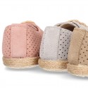 Suede leather Laces up style espadrille shoes with perforated design.