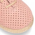 Suede leather Laces up style espadrille shoes with perforated design.