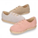 Suede leather Laces up style espadrille shoes with perforated design.