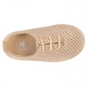 Suede leather Laces up style espadrille shoes with perforated design.