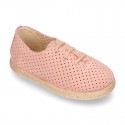 Suede leather Laces up style espadrille shoes with perforated design.