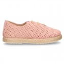 Suede leather Laces up style espadrille shoes with perforated design.