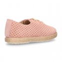 Suede leather Laces up style espadrille shoes with perforated design.