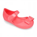 Jelly shoes Ballet flat style with ribbon and hook and loop strap.