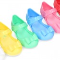 Jelly shoes Ballet flat style with ribbon and hook and loop strap.