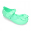 Jelly shoes Ballet flat style with ribbon and hook and loop strap.