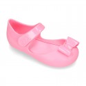 Jelly shoes Ballet flat style with ribbon and hook and loop strap.