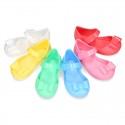 Jelly shoes Ballet flat style with ribbon and hook and loop strap.
