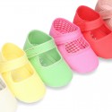 Cotton canvas baby little Mary Janes with velcro strap in seasonal colors.