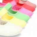 Cotton canvas baby little Mary Janes with velcro strap in seasonal colors.