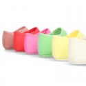 Cotton canvas baby little Mary Janes with velcro strap in seasonal colors.