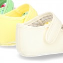 Cotton canvas baby little Mary Janes with velcro strap in seasonal colors.