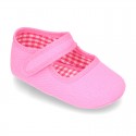 Cotton canvas baby little Mary Janes with velcro strap in seasonal colors.