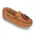 Moccasin shoes with tassels in suede leather color for kids.