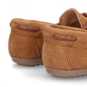 Moccasin shoes with tassels in suede leather color for kids.