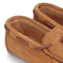 Moccasin shoes with tassels in suede leather color for kids.