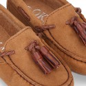 Moccasin shoes with tassels in suede leather color for kids.