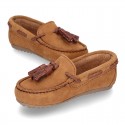 Moccasin shoes with tassels in suede leather color for kids.