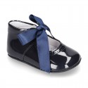 Patent leather little Mary Jane shoes for babies with ties closure.