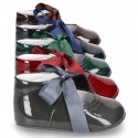 Patent leather little Mary Jane shoes for babies with ties closure.