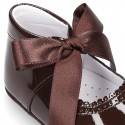 Patent leather little Mary Jane shoes for babies with ties closure.