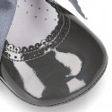 Patent leather little Mary Jane shoes for babies with ties closure.