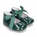 Patent leather little Mary Jane shoes for babies with ties closure.