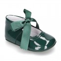 Patent leather little Mary Jane shoes for babies with ties closure.