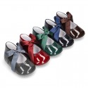 Patent leather little Mary Jane shoes for babies with ties closure.