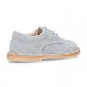 Classic Laces up shoes in pastel colors with chopped design in suede leather.