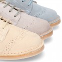 Classic Laces up shoes in pastel colors with chopped design in suede leather.