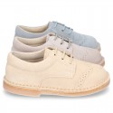 Classic Laces up shoes in pastel colors with chopped design in suede leather.