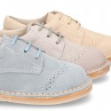 Classic Laces up shoes in pastel colors with chopped design in suede leather.