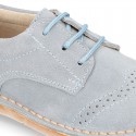 Classic Laces up shoes in pastel colors with chopped design in suede leather.