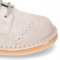 Classic Laces up shoes in pastel colors with chopped design in suede leather.