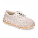 Classic Laces up shoes in pastel colors with chopped design in suede leather.