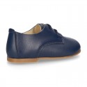 Classic laces up shoes in soft nappa leather with ties closure for little kids.