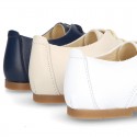 Classic laces up shoes in soft nappa leather with ties closure for little kids.
