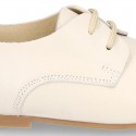 Classic laces up shoes in soft nappa leather with ties closure for little kids.