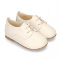 Classic laces up shoes in soft nappa leather with ties closure for little kids.