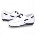 Classic white nappa leather Boat shoes with shoelaces and soles in navy color for kids.