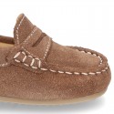 Suede leather Moccasins with detail mask and driver type Outsole for little boys.