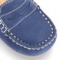 Suede leather Moccasins with detail mask and driver type Outsole for little boys.