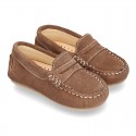 Suede leather Moccasins with detail mask and driver type Outsole for little boys.