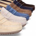 Suede leather kids moccasins shoes with detail mask and driver type Outsole.