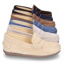 Suede leather kids moccasins shoes with detail mask and driver type Outsole.